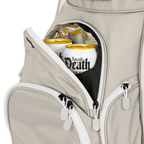 A close up shot of Cool Gray Big Rig golf bag's frosty pocket with canned drinks inside

