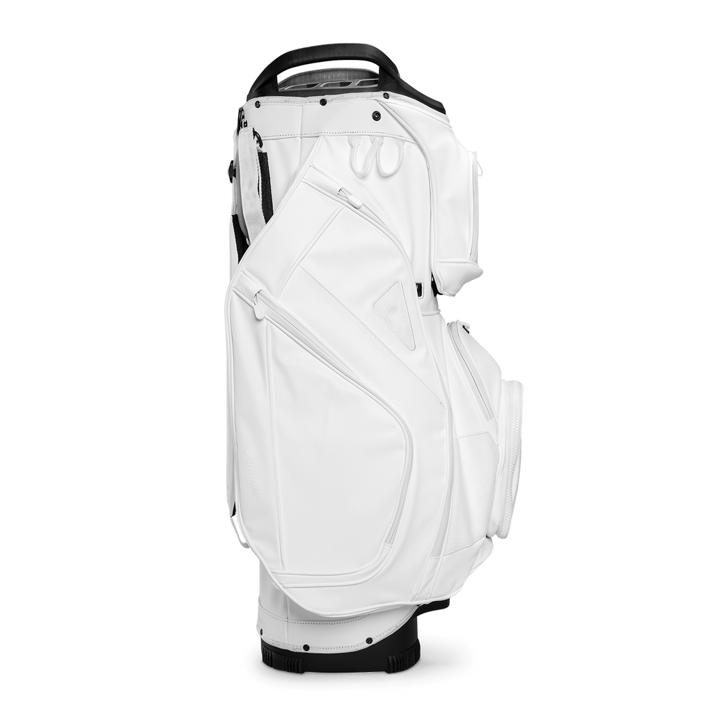 Side shot of Big Rig S-Class golf bag in white vegan leather showing the glove holder, easy access pockets and other features of the bag