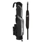 A full shot of Loma golf bag in matte black laying flat sideways beside its single strap