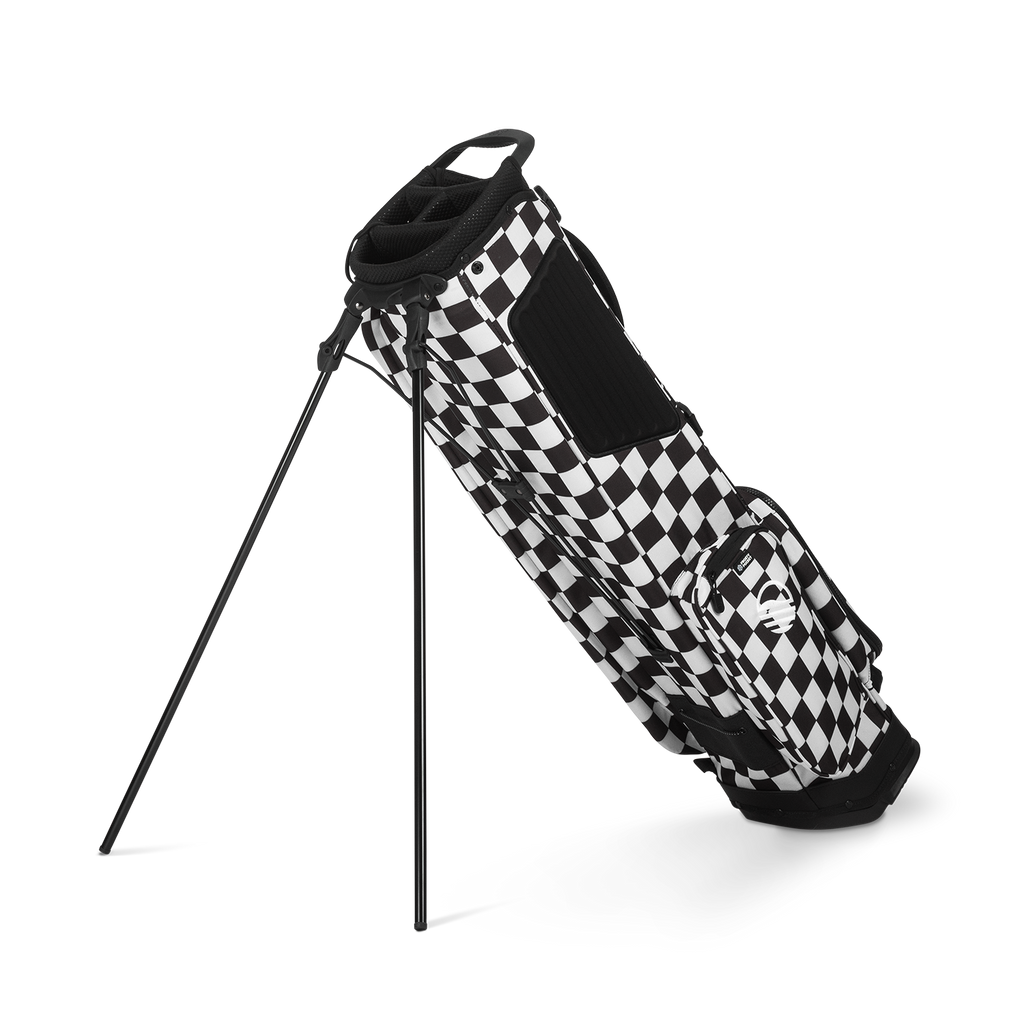 A full shot of El Camino golf bag in Black/White Checker facing backward 
