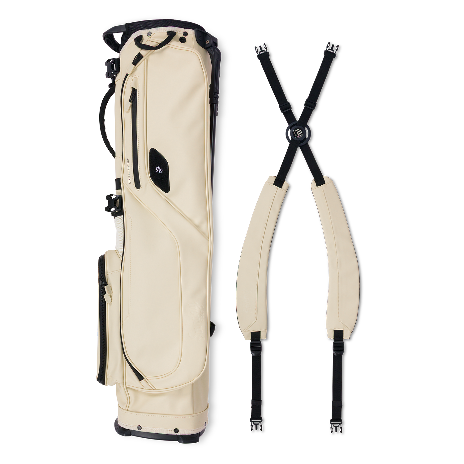 A full shot of El Camino S-class golf bag in Cream laying flat sideways beside its double strap 
