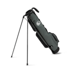 A full shot of standing Loma golf bag in midnight green facing backward