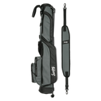 A full shot of Loma golf bag in midnight green laying flat sideways beside its single strap