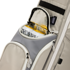 A close up shot of Cool Gray Ryder golf bag's frosty pocket with canned drinks inside
