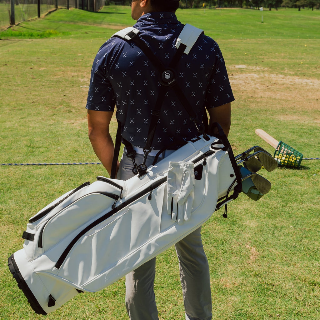 Back view of a man wearing the Ryder S-Class in white vegan leather with its double straps