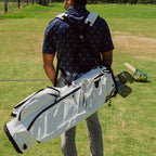 Back view of a man wearing the Ryder S-Class in white vegan leather with its double straps